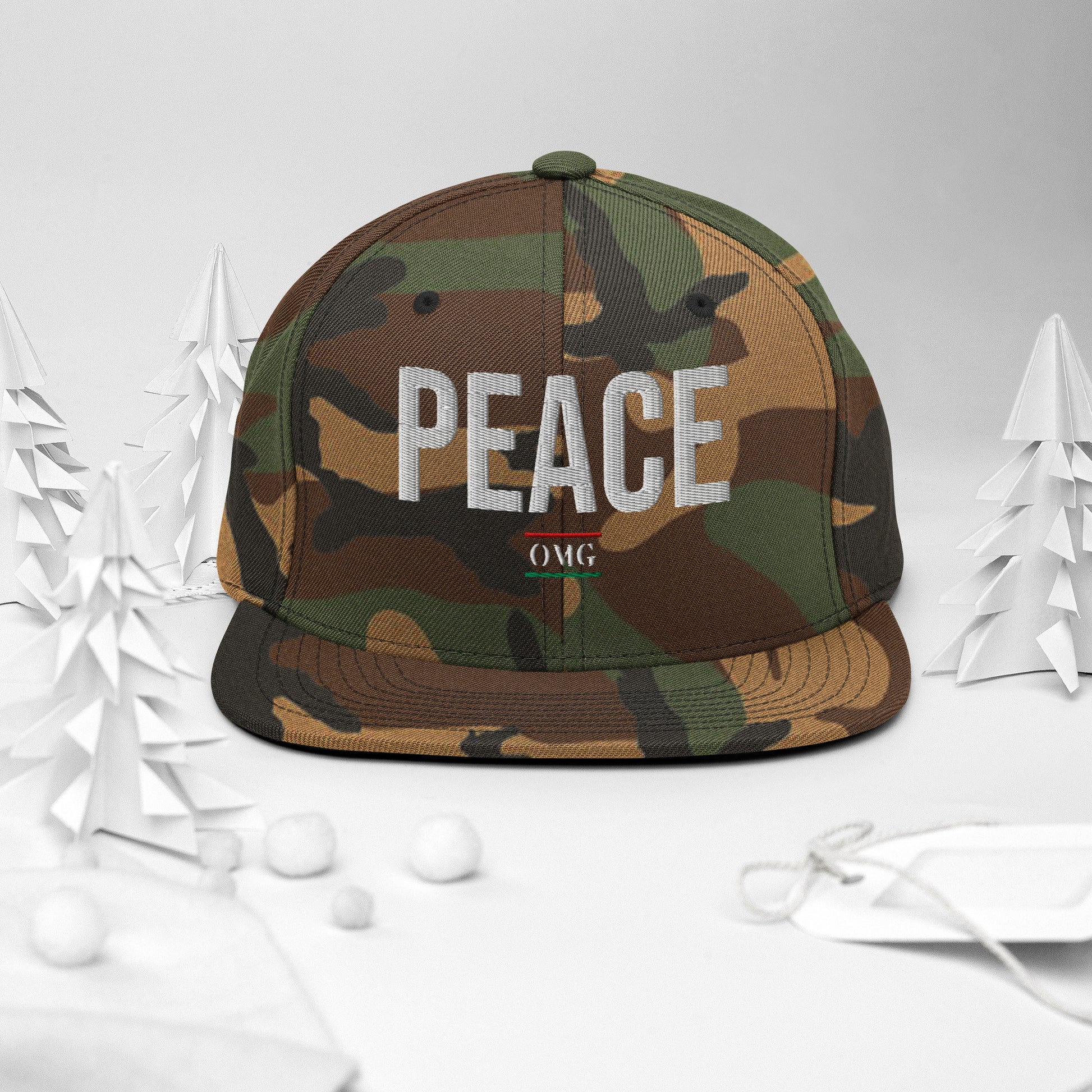 Camouflage cap with 'PEACE' and 'OMG' text on a white background