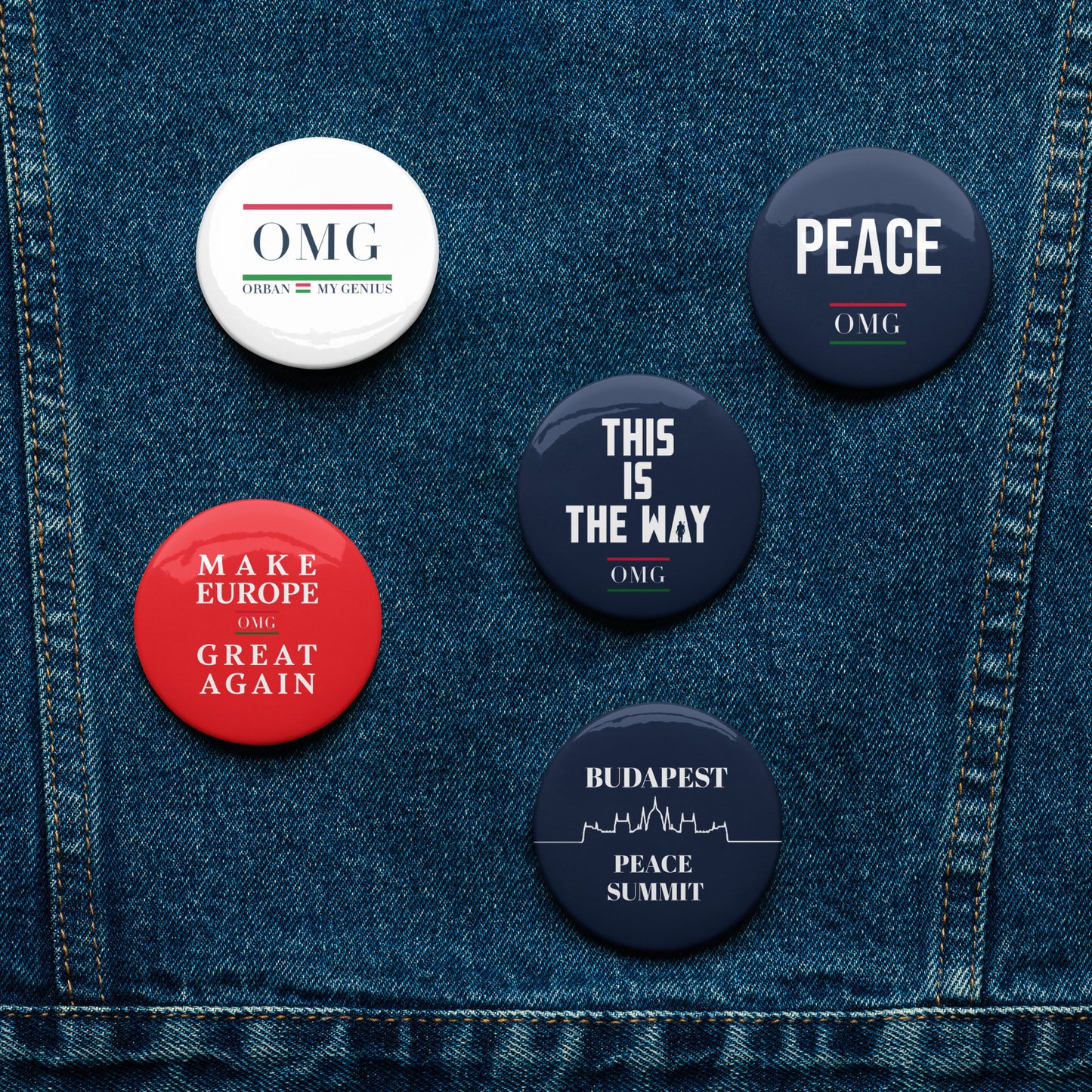 Set of buttons with various designs on a denim background